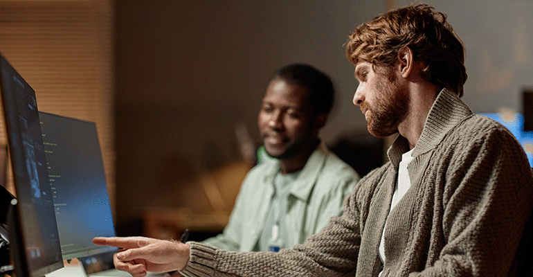 colleagues-reviewing-data-in-office-2025-03-08-08-45-42-utc